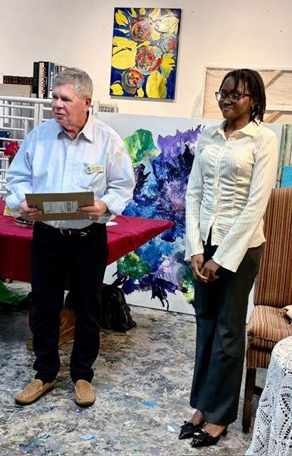 Jack Hopkinms, STF Treasurer and Yoldine Cius
