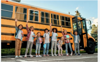 kids waving in front of the bus Screenshot 2023-02-14 at 12.41.00 PM